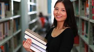 Student holding books